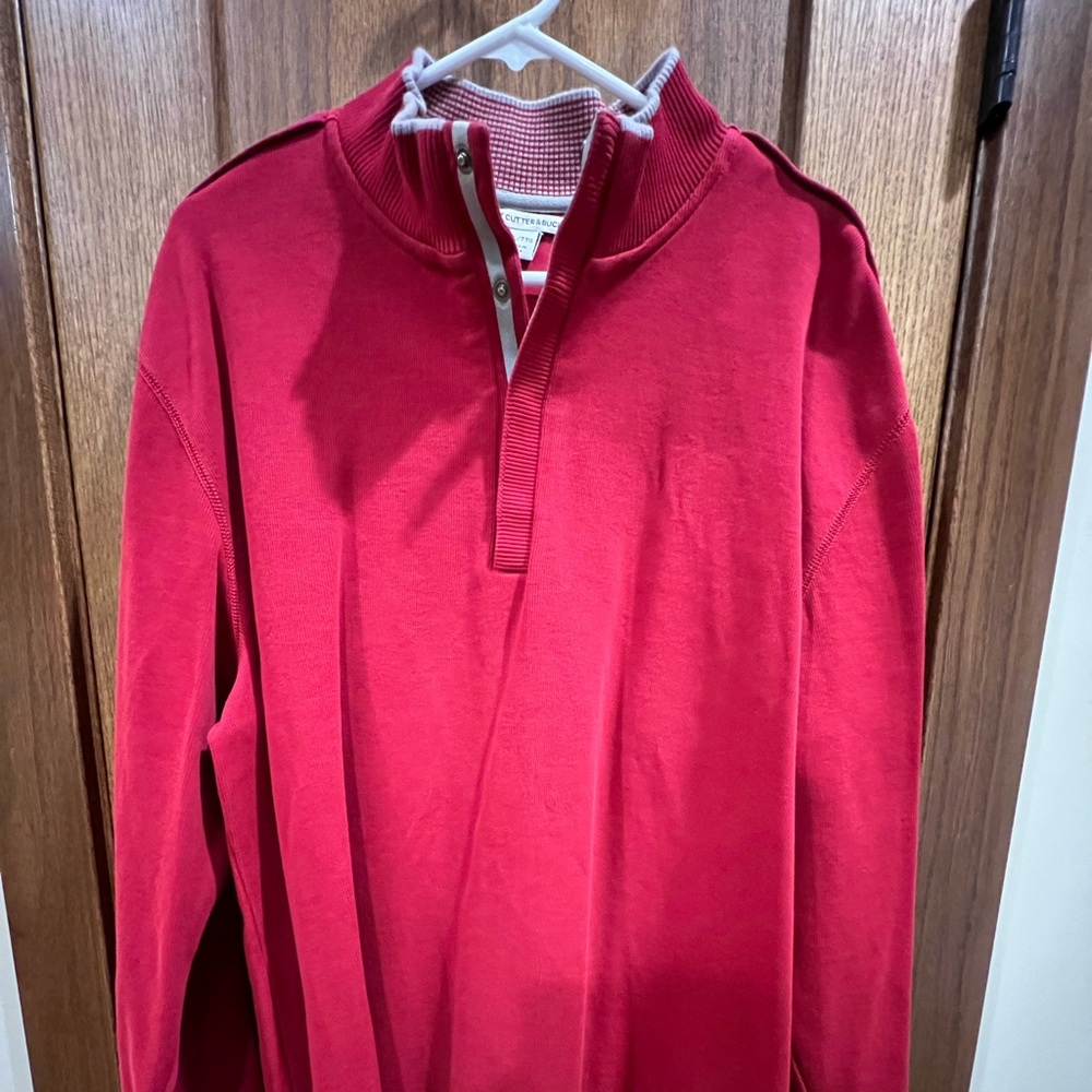 Red with silver accents Cutter & Buck button neck shirt. Size 2 XL